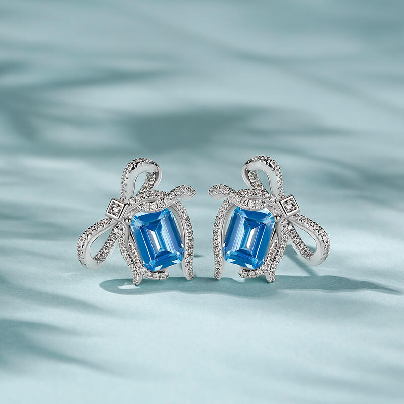Jeulia Pendientes de plata de ley con nudo de piedra azul esmeralda