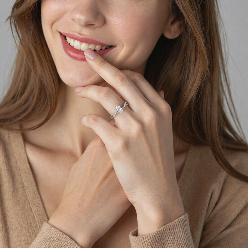 "Twinkling Love" 0.5ct Marquise Cut Side Stone Engagement Ring