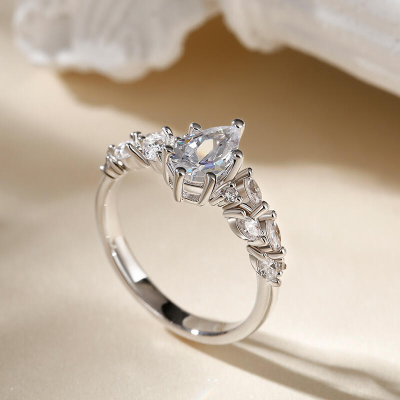 Jeulia Anillo de boda con corte pera para mujer de plata de ley