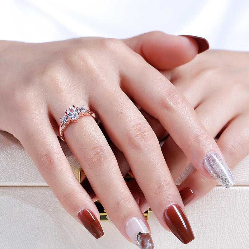 Jeulia 10K/14K/18K Gold Platinum Twist Three Stone Oval Cut Ring