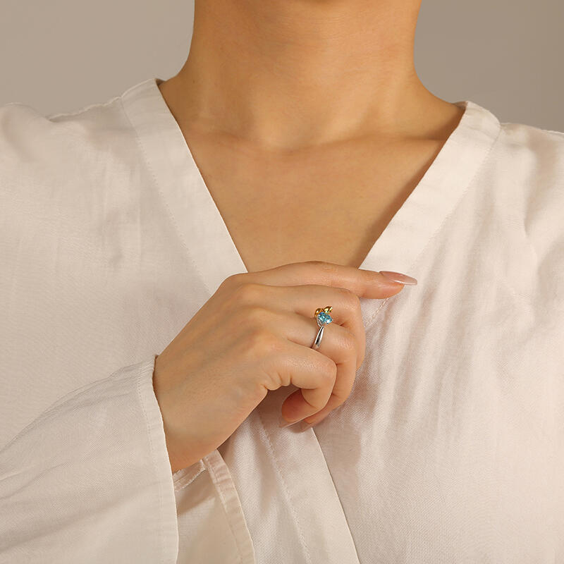 "My Furry Friend" Round Cut Side Stone Engagement Ring