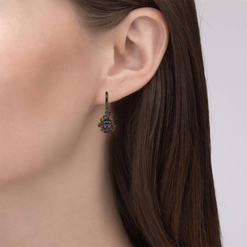 Jeulia Pendientes de plata de ley con calavera de fuego