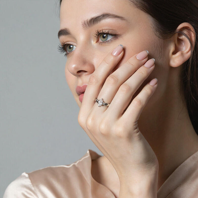 "My Forever Love" Marquise Cut Side Stone Engagement Ring