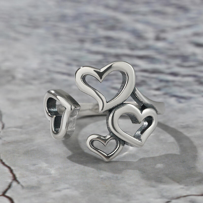 Jeulia Anillo abierto de plata de ley con cuatro corazones lindos