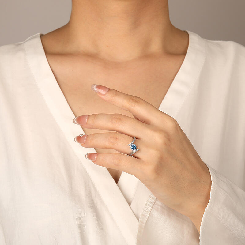 "Into Love River" Round Cut Side Stone Engagement Ring