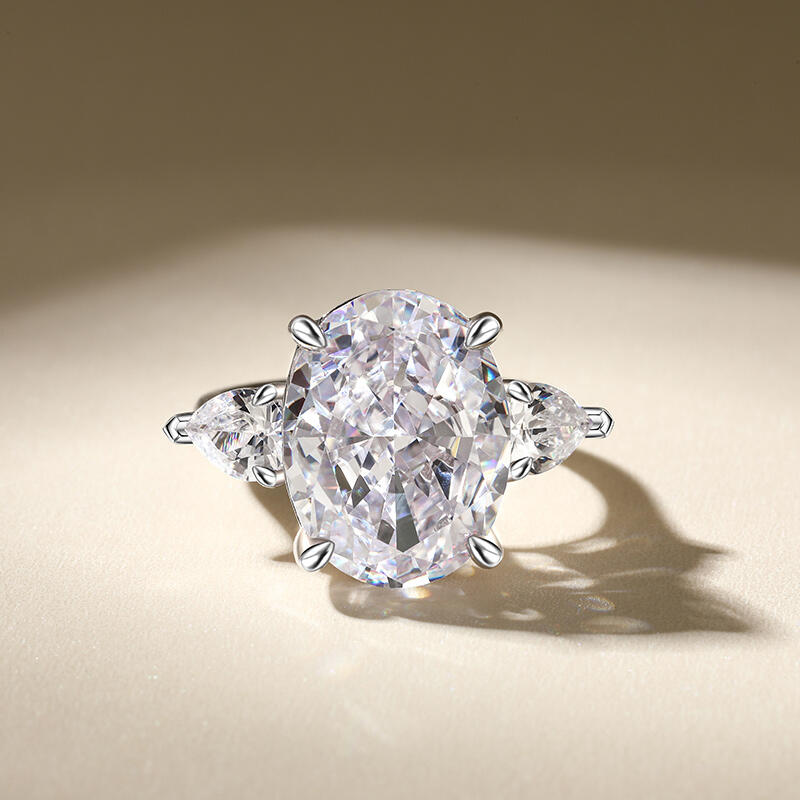 Jeulia Three Stone Oval Cut Sterling Silver Ring