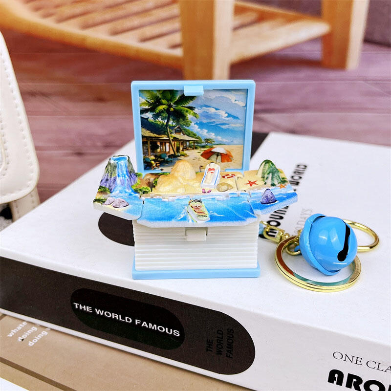 Llavero creativo de mundo de fantasía con libro desplegable en 3D, regalo interesante para amigos.