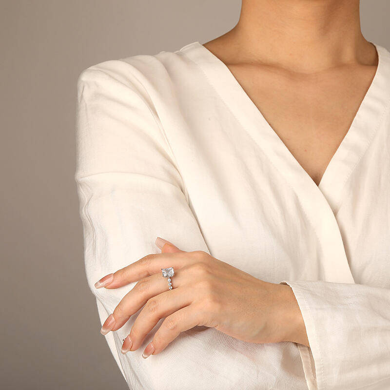 "Love Beyond Measure" Radiant Cut Side Stone Engagement Ring