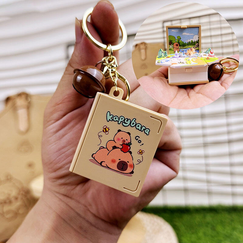 Llavero creativo de mundo de fantasía con libro desplegable en 3D, regalo interesante para amigos.