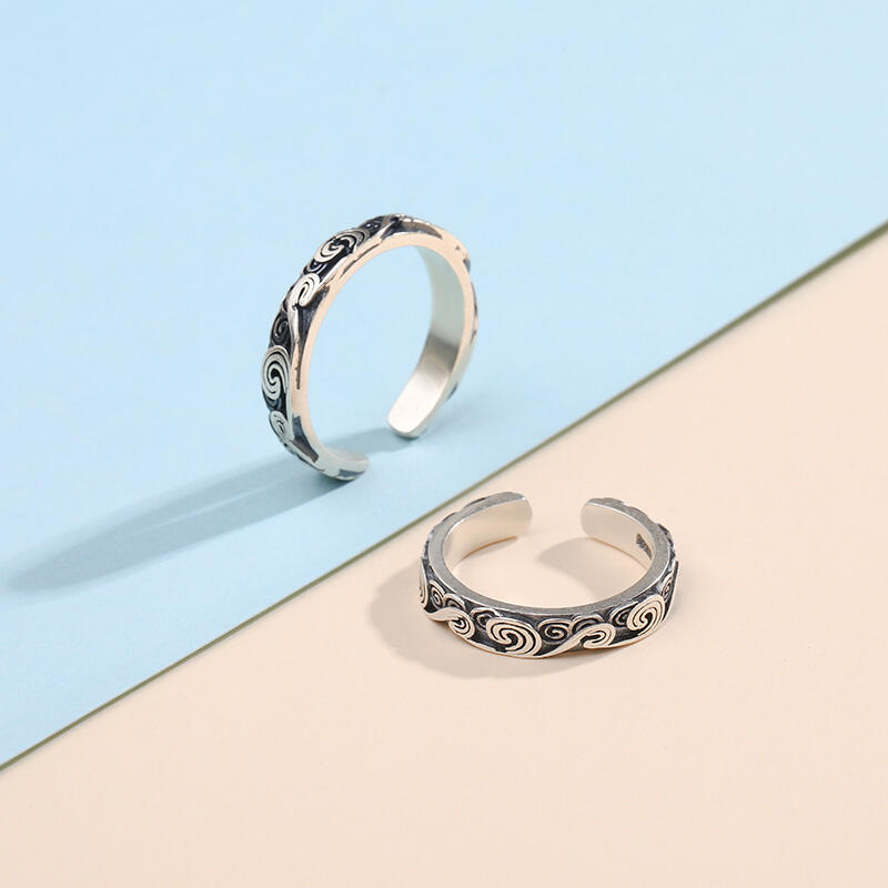Jeulia Anillos de pareja de diseño abierto grabado con nubes de plata de ley