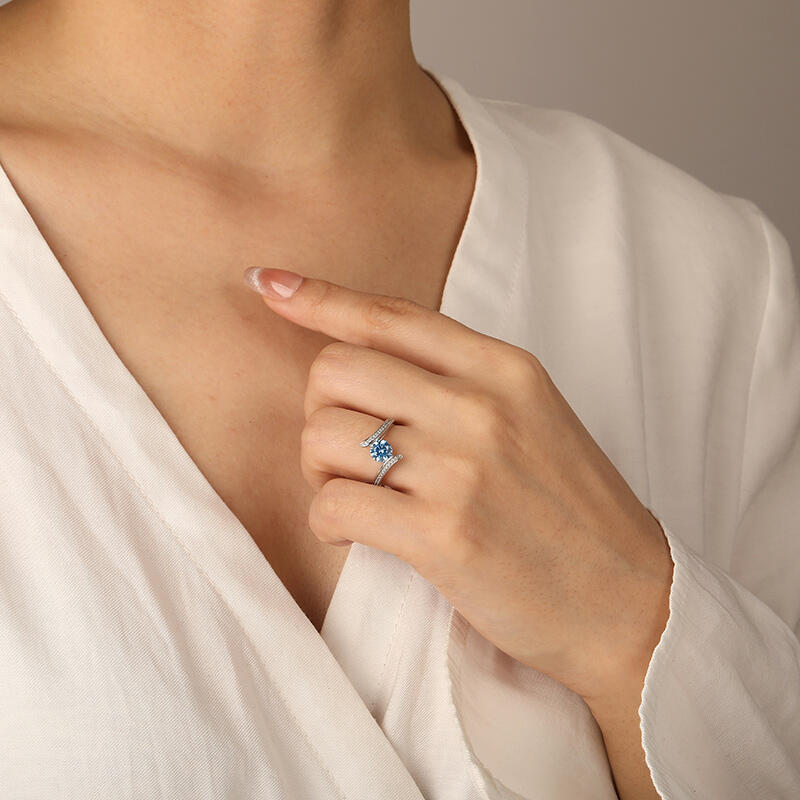 "Into Love River" Round Cut Side Stone Engagement Ring