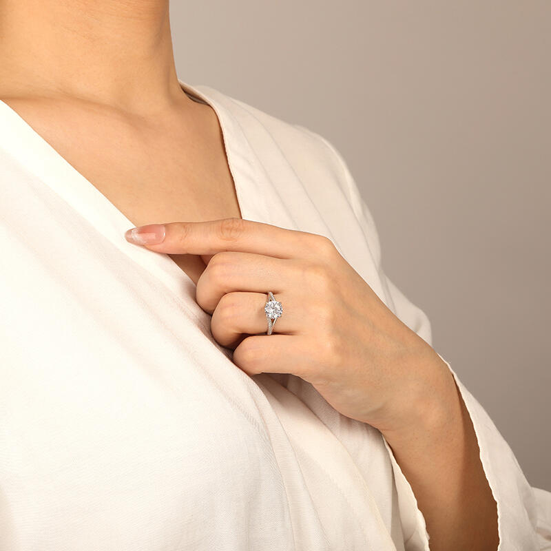 "With Your Love" Round Cut Side Stone Engagement Ring