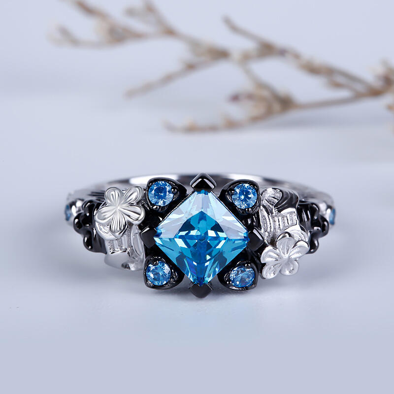 Jeulia Flower Design Princess Cut Sterling Silver Two Skull Ring