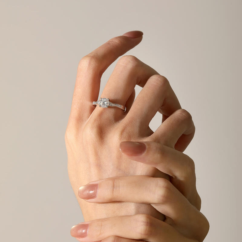 Jeulia Classic Twist Round Cut Engagement Ring Sterling Silver