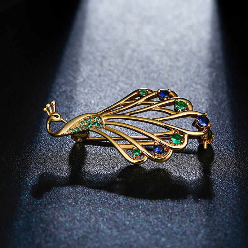 Jeulia Broche con diseño de pavo real de plata de ley
