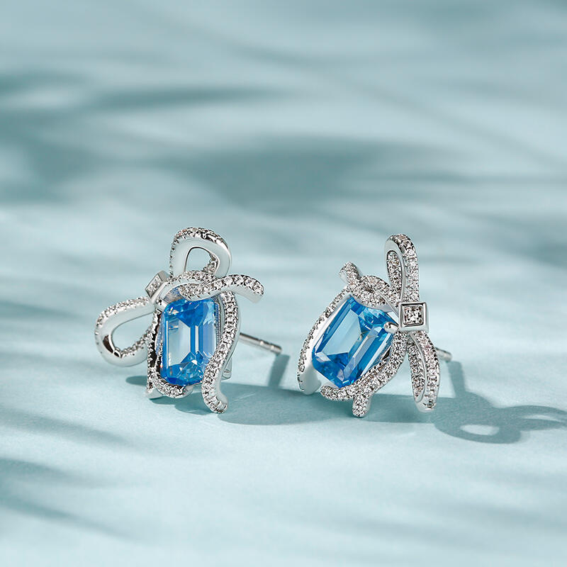 Jeulia Pendientes de plata de ley con nudo de piedra azul esmeralda