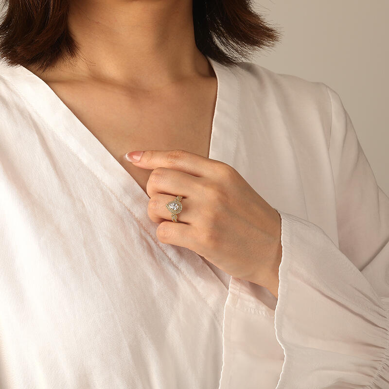 "Ich bin Du" Birnenschliff Halo-Verlobungsring