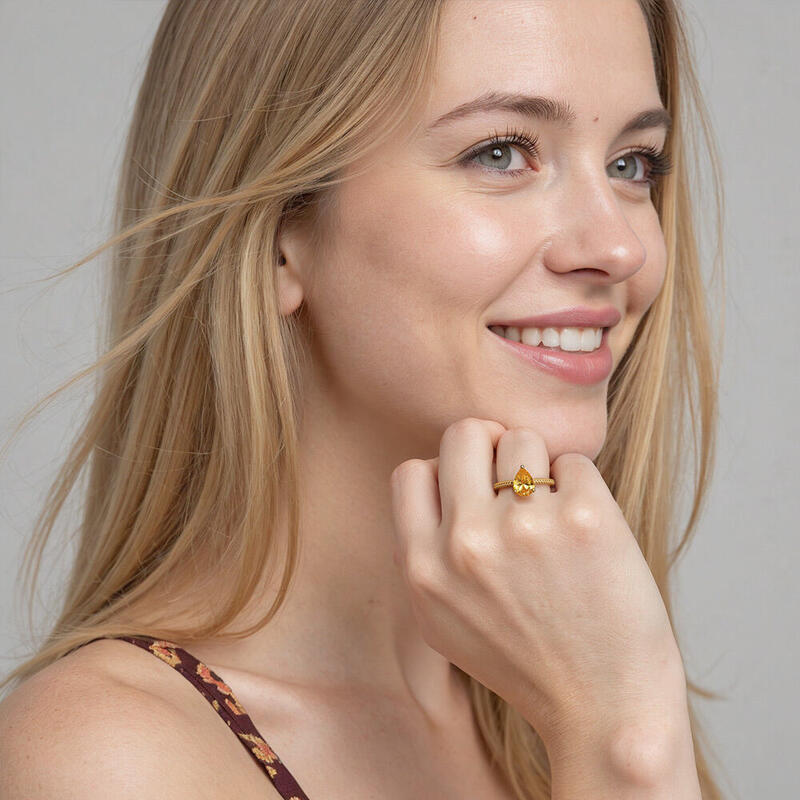 "You’re In Love" Pear Cut Side Stone Engagement Ring