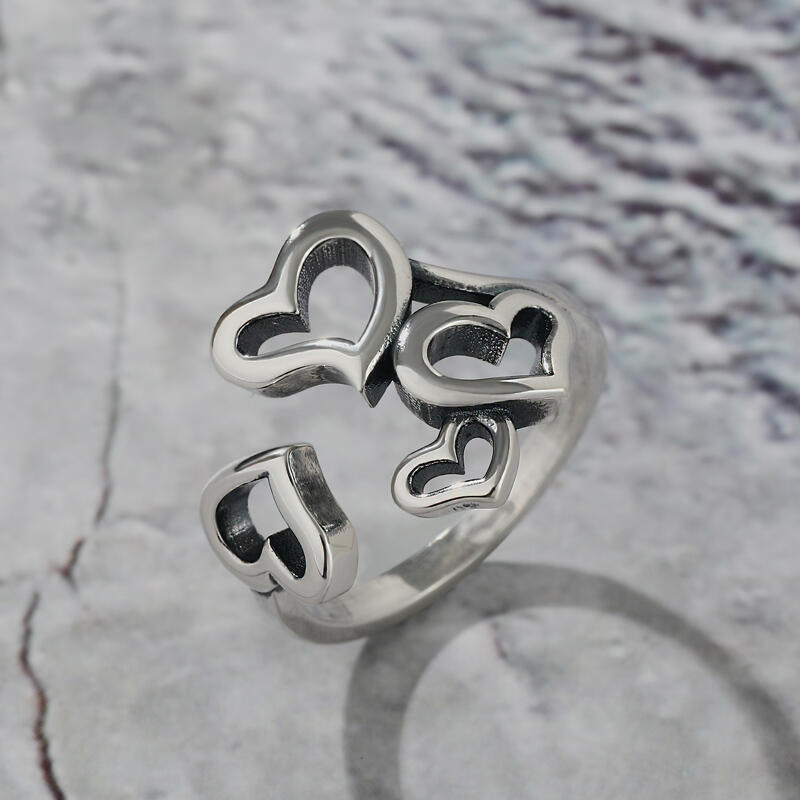 Jeulia Anillo abierto de plata de ley con cuatro corazones lindos