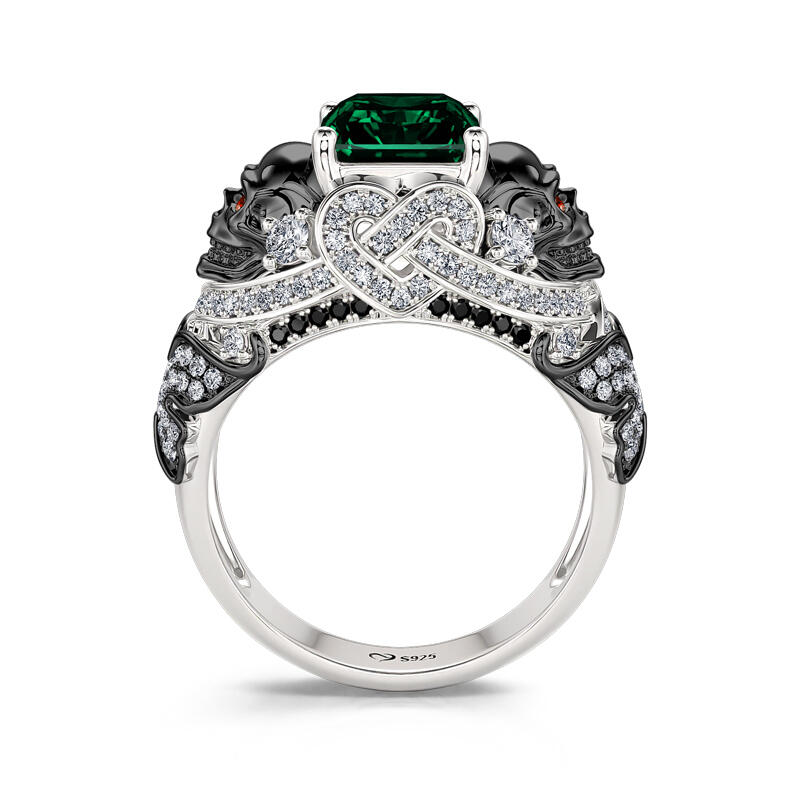 Jeulia Anillo de Plata de Ley Diseño Calavera y Mariposa con Corte Esmeralda