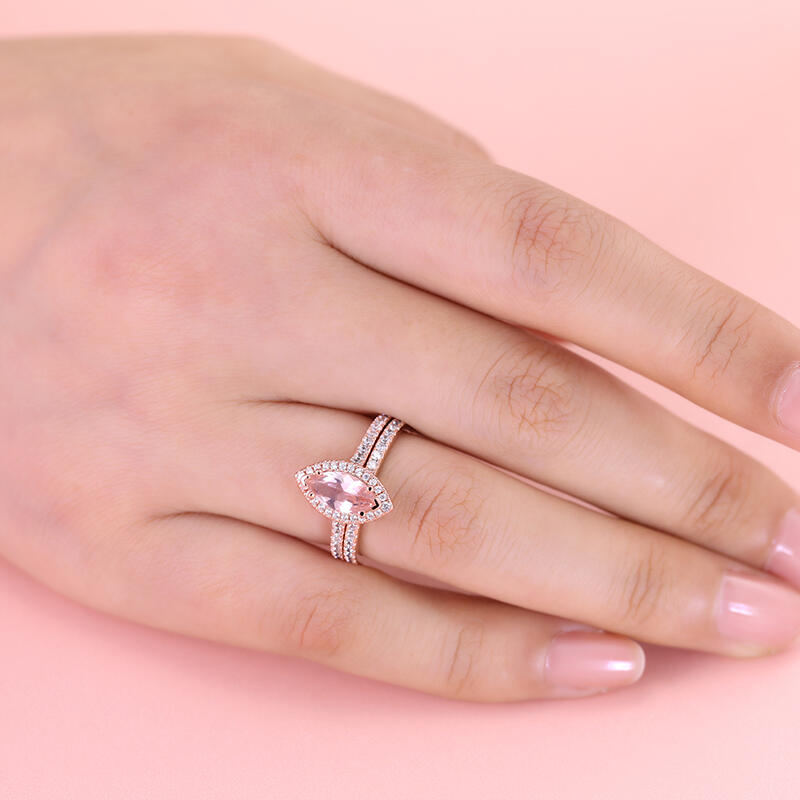 Jeulia Juego de Anillos de Plata de Ley con Morganita Sintética de Corte Marquesa con Halo