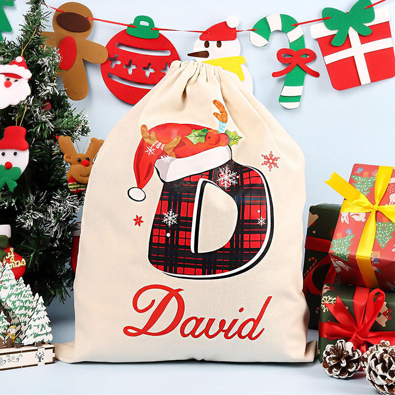 Julklappspåse med personligt namn och valfri bokstav Speciell present till familjen