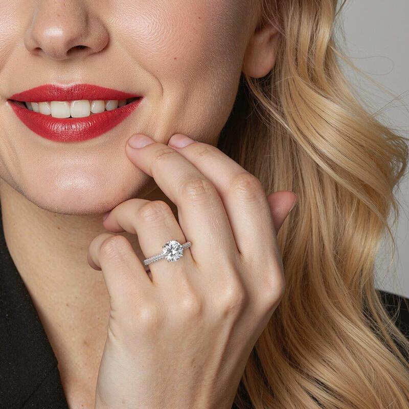 "Every Moment of Love" Round Cut Side Stone Engagement Ring