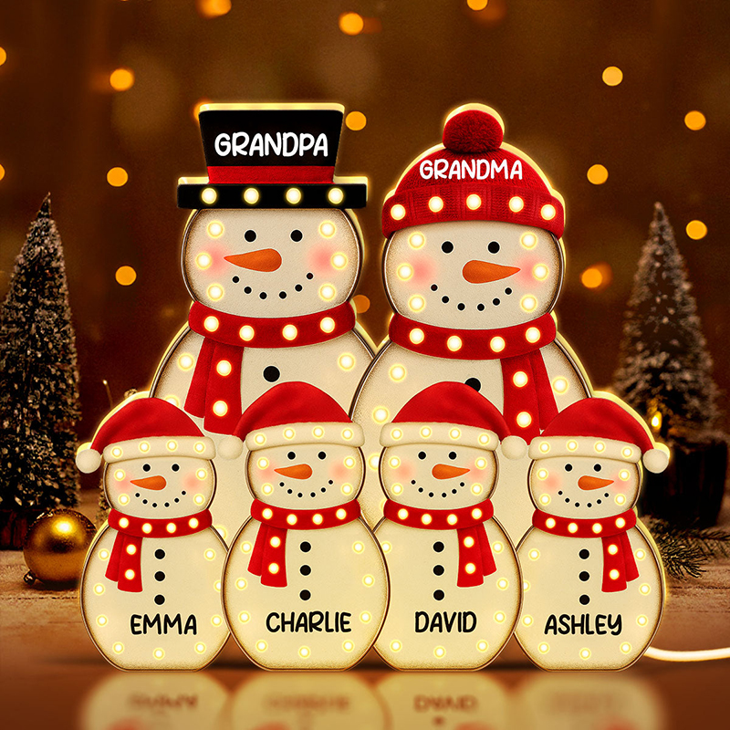 Personlig nattlampa med namn och snögubbefamiljemotiv en utsökt julklapp