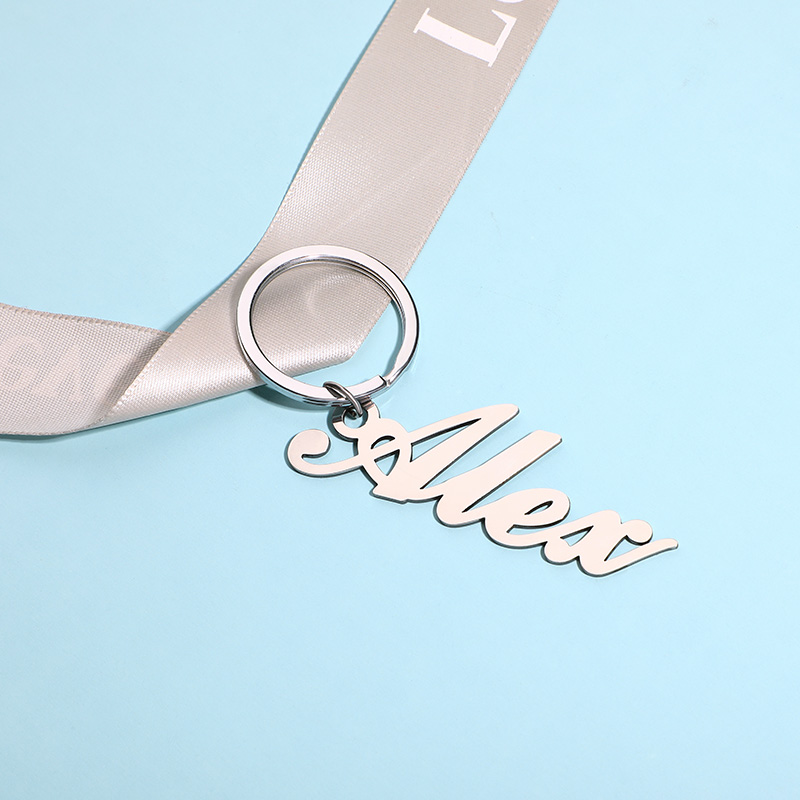 "Din present" Nyckelring med egen gravyr