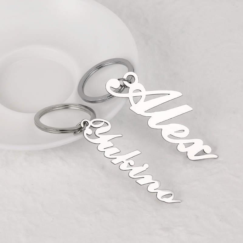 "Din present" Nyckelring med egen gravyr