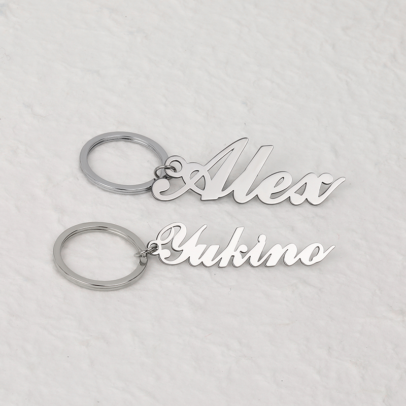 "Din present" Nyckelring med egen gravyr