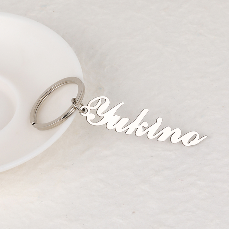 "Din present" Nyckelring med egen gravyr