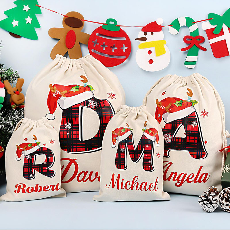 Julklappspåse med personligt namn och valfri bokstav Speciell present till familjen