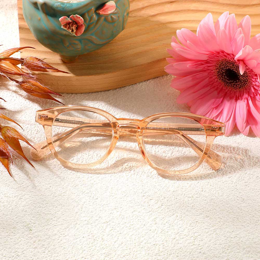 Daisy Runde Champagne Brille